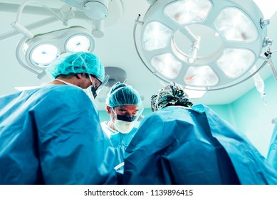 Team of Surgeons Operating in the Hospital