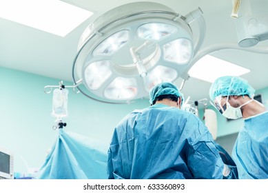 Team Of Surgeons Operating In The Hospital.