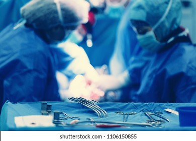 Team Of Surgeons Operating Wearing Lamp Lighting Electric Cautery And Flex Clamp, Heart Surgery Intervention Close-up Replace Valve Open Cord Surgery Minimally Invasive Surgeon. Live Heart Beating