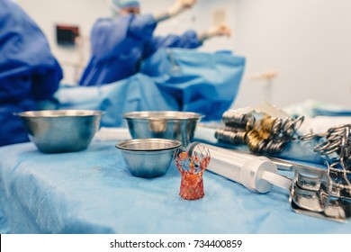 Team Of Surgeons Operating Wearing Lamp Lighting Electric Cautery And Flex Clamp, Heart Surgery Intervention Close-up Replace Valve Open Cord Surgery Minimally Invasive Surgeon. Live Heart Beating