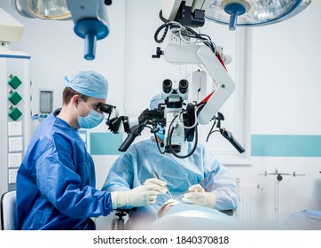 A Team Of Surgeons Performing Brain Surgery To Remove A Tumor.