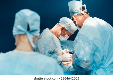 A team of surgeons performs a complex operation to remove a pancreatic cyst using medical instruments