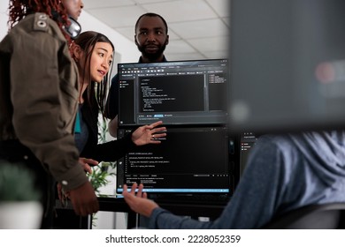 Team of system engineer writing data and discussing about coding language, analyzing server code and database. IT engineers working with cloud computing terminal window in software company