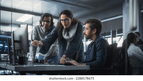 Team of Three Diverse South Asian Software Developers Talk, Discuss a Technological Project. Empowered Indian Female Specialists and Two Colleagues Work on Digital Software as a Service Business