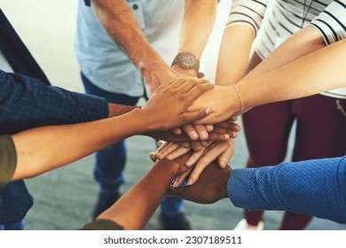 Team trust, hands together and motivation of staff with collaboration, support and community. Diversity, worker friends and group with achievement, solidarity and agreement hand sign for teamwork - Powered by Shutterstock