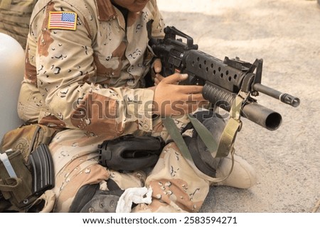 Team of U.S. Army marine corps soldier military war with gun weapon participating and preparing to attack the enemy in Thailand during exercise Cobra Gold training in battle. Combat force.
