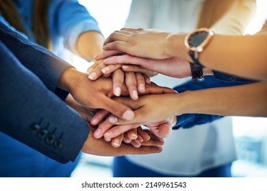 As A Team Well Go Far. Cropped Shot Of A Group Of Unrecognizable Businesspeople Joining Their Hands Together In Unity.