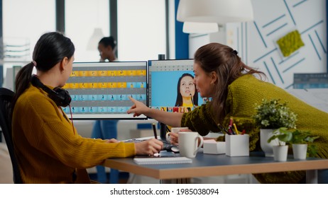 Team Of Women Retouchers Working With Modern Photo Editing Software App In Digital Multimedia Company, Discussing And Taking Notes. Art Director Consulting Designer Colleague, Retouching Portrait