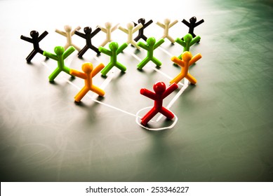 Team Work Organizational Chart Concept, Colorful Dolls On Blackboard. 