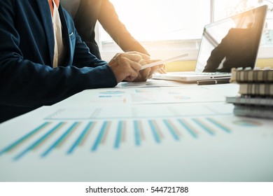 Team work process. Business managers crew working with new start up project. laptop,tablet on wood table in office. - Shutterstock ID 544721788