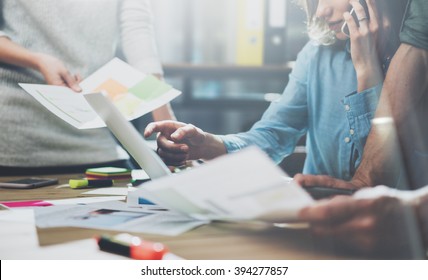 Team Work Process. Photo Young Businessmans Crew Working With New Startup Project. Generic Design Notebook On Wood Table.  Analyze Plans Hands, Keyboard. Blurred Background, Film Effect