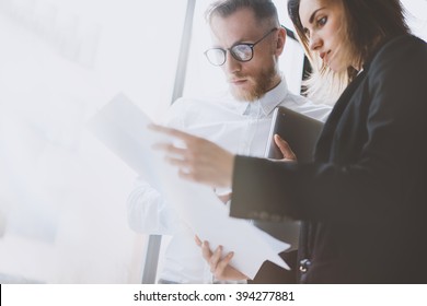 Team Work Process. Photo Young Professionals Crew Working With New Startup Project. Project Managers Meeting. Analyze Plans, Papers. Blurred Background, Film Effect