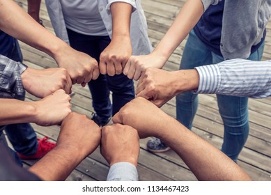 Team Work or success Concept : Group of Diverse Hands Together Cross Processing of young people in park - Shutterstock ID 1134467423