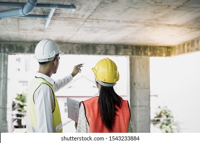 Team of worker, Inspector or engineers is checking, inspecting and discussing plan to renovation the building or house. Inspection and Engineering concept.