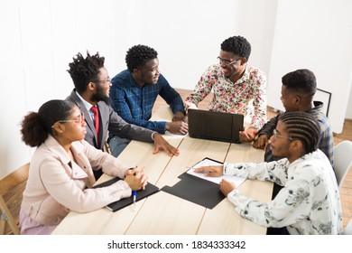 team of young african people at work in the office - Shutterstock ID 1834333342