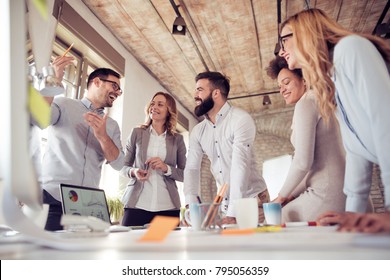 Team of young engineers working together in a architect studio.Start up business. - Shutterstock ID 795056359