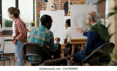 Team Of Young Man And Elder Person Attending Art School Class Together To Learn Drawing Skills For Personal Development And Growth. Educational Program To Draw Artwork Sketch.