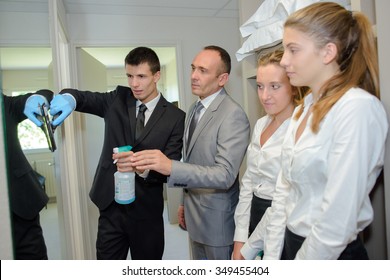 Team Of Young People Learning Housekeeping