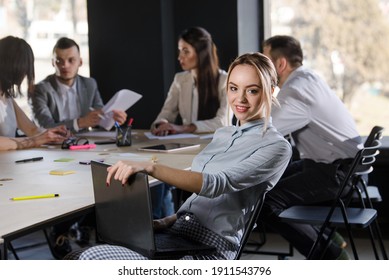 Team Of Young People In The Office Working