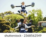 Teamwork, air or girl cheerleader training in fitness workout, exercise or learning routine on field. Jump, dance or sports woman in group for motivation, inspiration or support on college campus