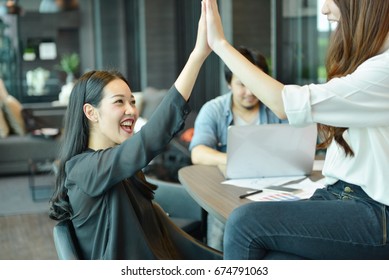 Teamwork Of Asian Business People Giving High Five, Tag Team