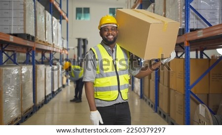 Teamwork of black workers working in large warehouse store industry.Rack of stock storage. Interior of cargo in ecommerce and logistic concept. Depot. People lifestyle. Shipment service for container