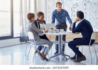 Teamwork, brainstorming and laptop in office with collaboration, partnership and agenda for project. People, planning and meeting in workplace with idea, strategy and cooperation for startup business - Powered by Shutterstock