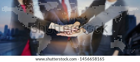 Teamwork of business handshake for successful of investment deal and city night background, teamwork and partnership concept.

concept.