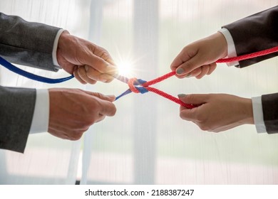 Teamwork businessman team, team people hold rope partnership, cooperation, concept.