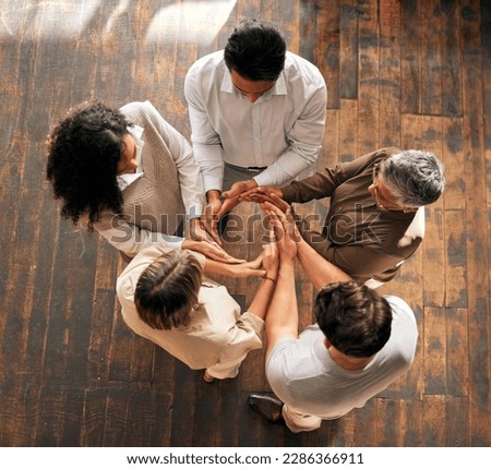 Teamwork, circle and synergy of people hands for collaboration, workflow and group or team building above. Integration, formation and support, cooperation or community of women and men with agreement