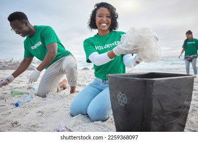 Teamwork, cleaning and volunteer with people on beach for sustainability, environment and eco friendly. Climate change, earth day and nature with friends and plastic for help, energy and pollution - Powered by Shutterstock