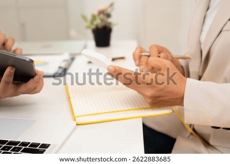 Teamwork, collaboration, and planning with design or strategy documents in the office, business start-ups, gender equality, and marketing ideas about diversity in workplace meetings.