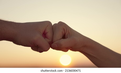 Teamwork Concept. Fist To Fist Commit Solidarity A Respect And Brotherhood Gesture. Lifestyle Business Team Hands Fists Close-up. People Of Different Skin Colors Partnership Friendship Teamwork