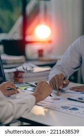 Teamwork Concept, A Group Of Business People Meeting To Analyze And Discuss And Brainstorm Financial Report Chart Data In A Financial Advisory Office. Vertical Picture