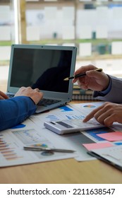 Teamwork Concept, A Group Of Business People Meeting To Analyze And Discuss And Brainstorm Financial Report Chart Data In A Financial Advisory Office. Vertical Picture