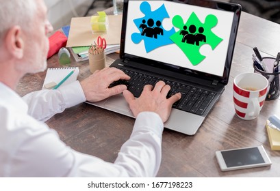 Teamwork concept shown on a laptop screen
