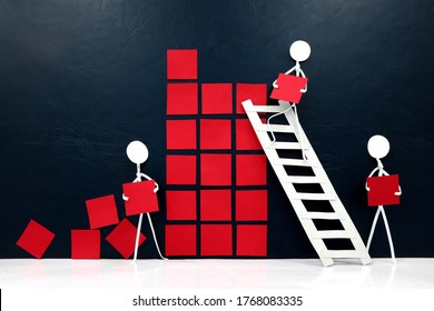 Teamwork, Cooperation And Rebuilding Business Economy Concept. Human Stick Figures Fixing Broken Building Blocks.