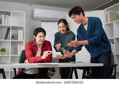 Teamwork and Creative Process. Engaging in UXUI design discussions at a collaborative workspace.