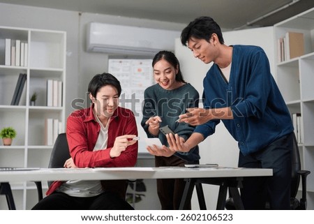 Teamwork and Creative Process. Engaging in UXUI design discussions at a collaborative workspace.