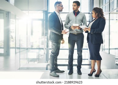 Teamwork, development and working together group of businesspeople, team or colleagues sharing ideas. Diverse coworkers talking, planning and discussing creative strategy - Shutterstock ID 2188929623