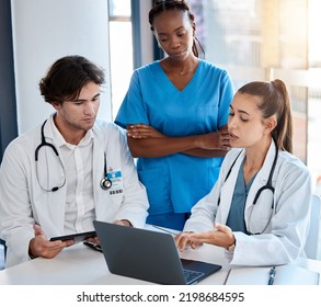 Teamwork, Doctors And Collaboration On Laptop During A Meeting In A Conference Room. Diverse Healthcare Workers Discussing Modern Treatment And Innovation, Brainstorming To Find A Cure For Sickness