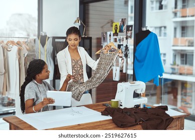 Teamwork, fashion designer or people with dress in small business for order, ideas or creative clothes. Tablet, stylist or women planning in startup agency for boutique, modern style or fabric piece - Powered by Shutterstock