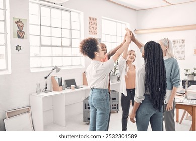 Teamwork, high five or people in studio for creativity, collaboration or positive reinforcement. Fashion designer group, hand gesture or happy in office for exciting project, support or agency growth - Powered by Shutterstock