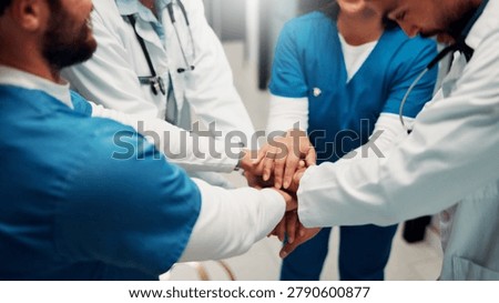 Teamwork, hospital and doctors with hands stack for collaboration, support and solidarity. Healthcare, clinic and people in huddle for union, synergy and achievement for medical service together