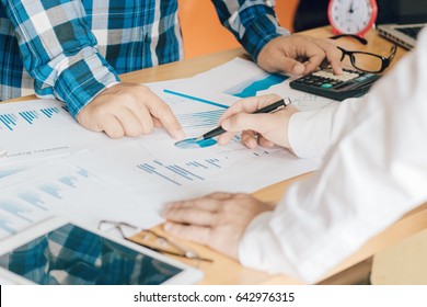 Teamwork Join Hands, Close up of business partners personnel making analysis graph for idea at meeting and blurred background, business concept. - Shutterstock ID 642976315
