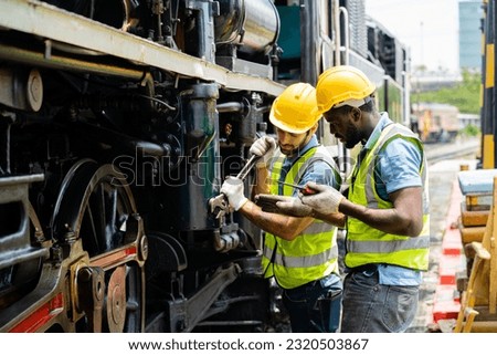 The teamwork of machine maintenance engineering is checking the availability of railway machinery.