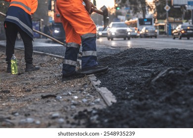 Teamwork on road construction. Men at work.