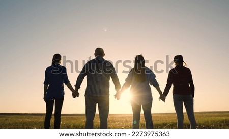 Teamwork of people raising their hands to sky, family business team concept. Group of people holding hands raise their hands to sky, prayer of man of woman. Business people, partners, trust concept