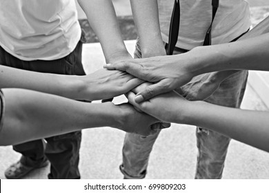 Teamwork people touch hands for unity group to succuss business. - Shutterstock ID 699809203