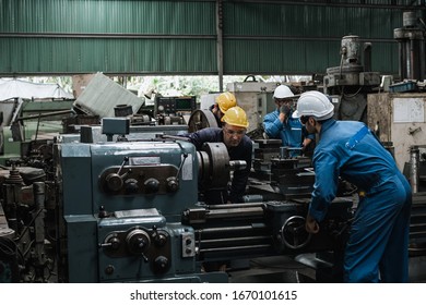 Teamwork professional engineer working heavy industry in factory, Industry team concept.